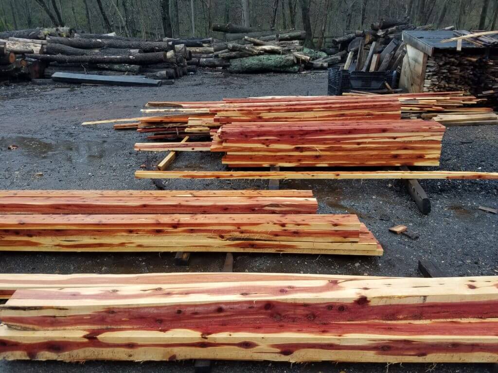 Fresh cut cedar lumber for a fence