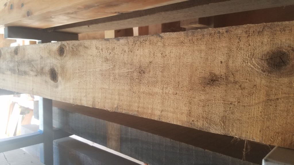 reclaimed large beam for a mantle